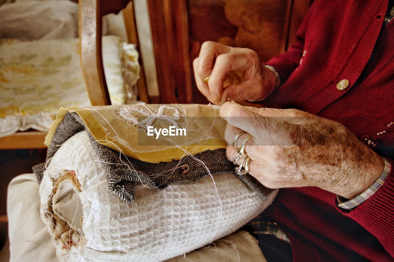 Close-up of woman hand working at home