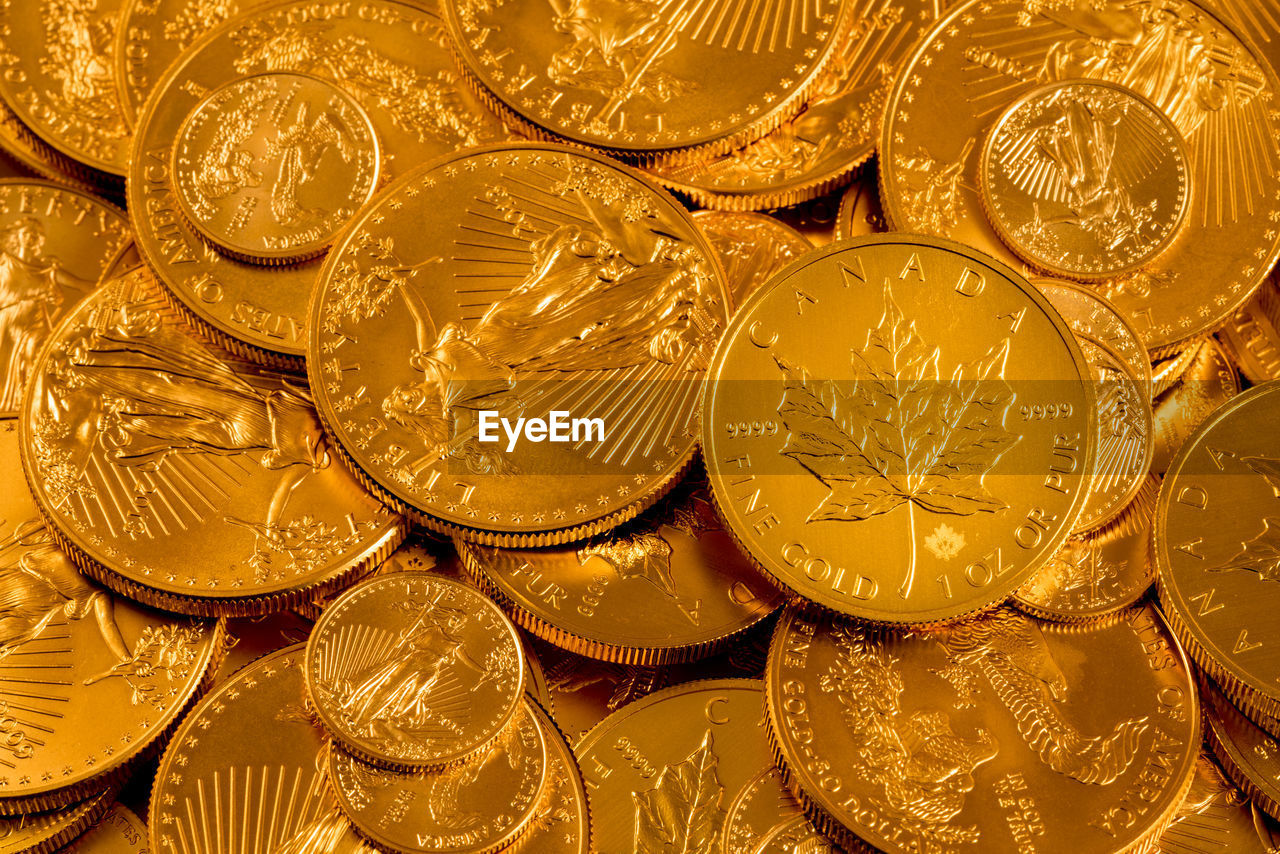 Close-up of gold colored coins