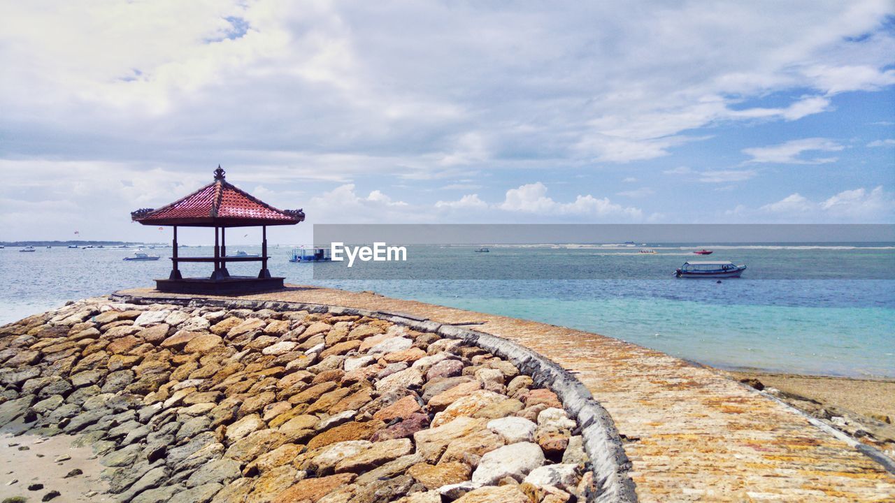 Scenic view of calm sea against sky