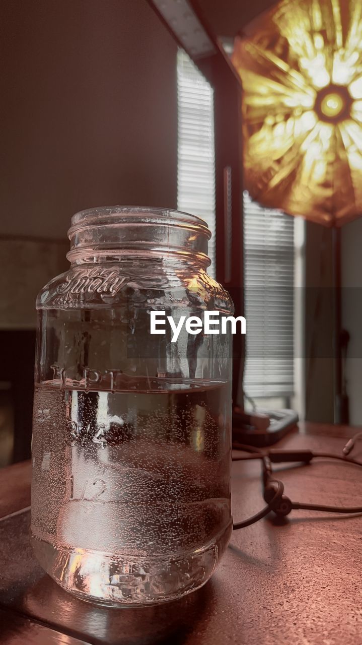 lighting, indoors, mason jar, food and drink, jar, table, no people, container, glass, nature, food, focus on foreground, still life, drink