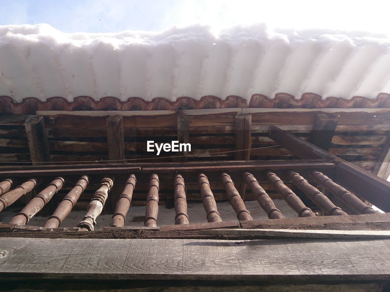 Close-up of wood against sky