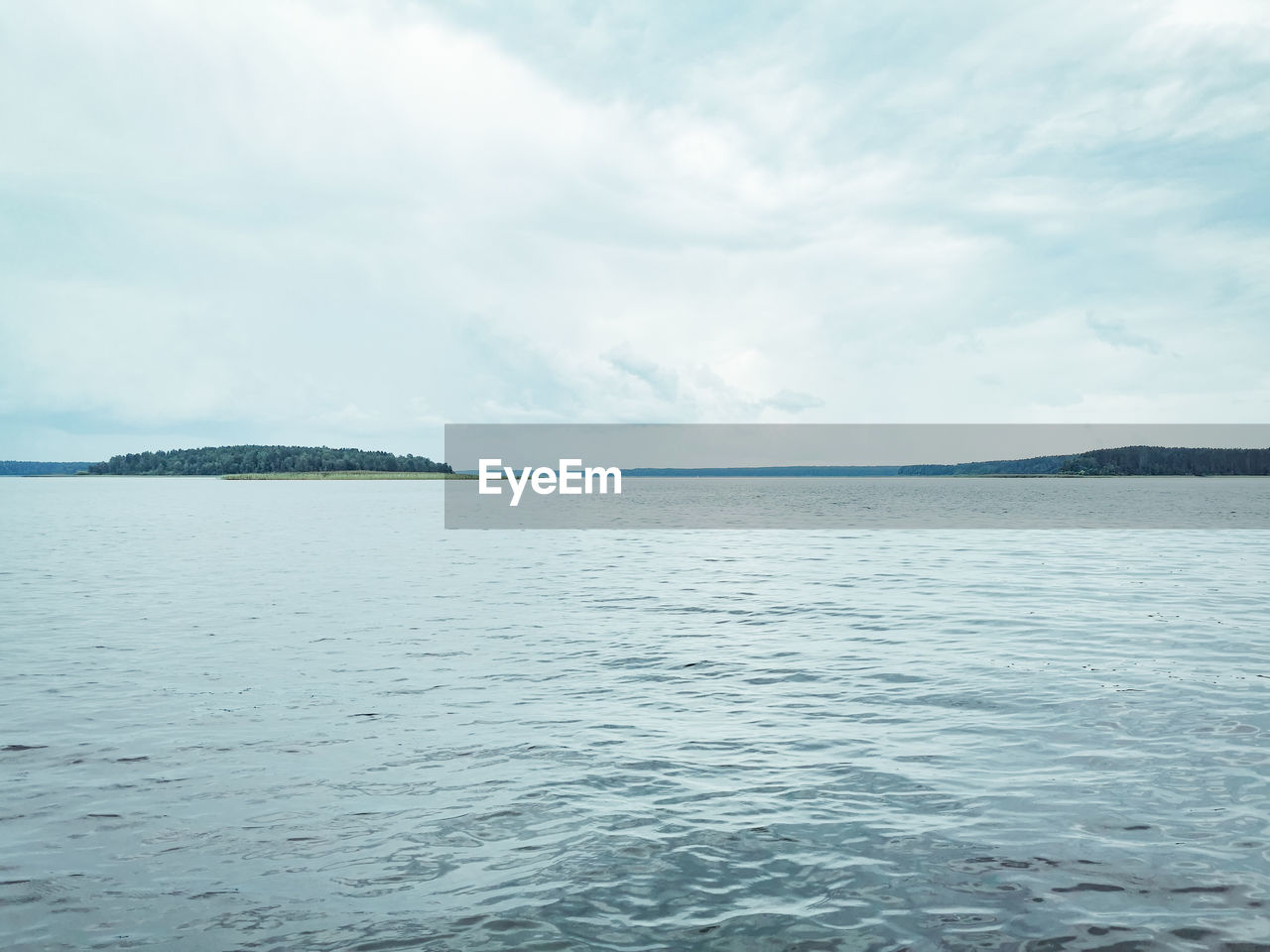 TRANQUIL VIEW OF SEA AGAINST SKY