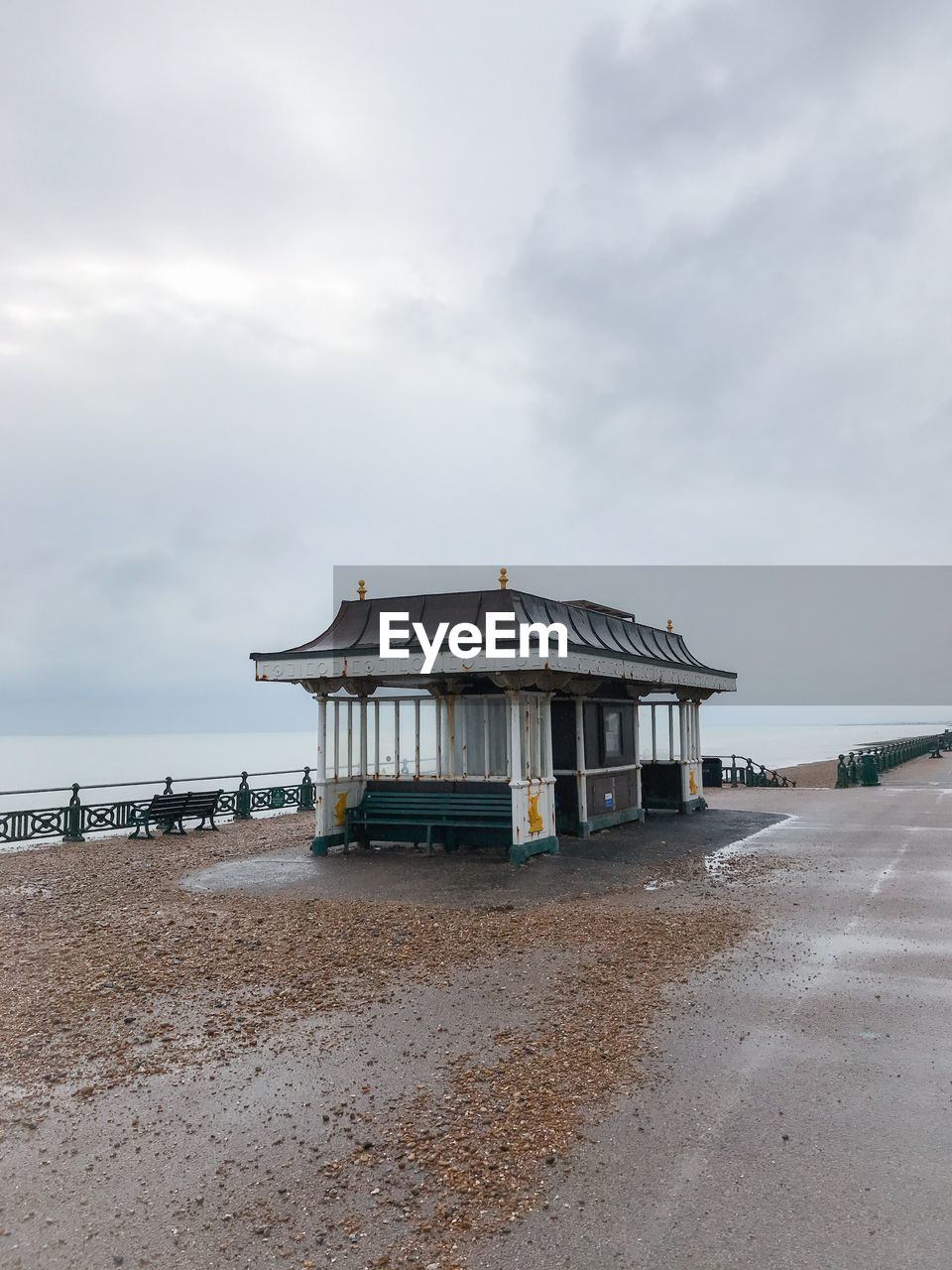 Built structure on beach against sky