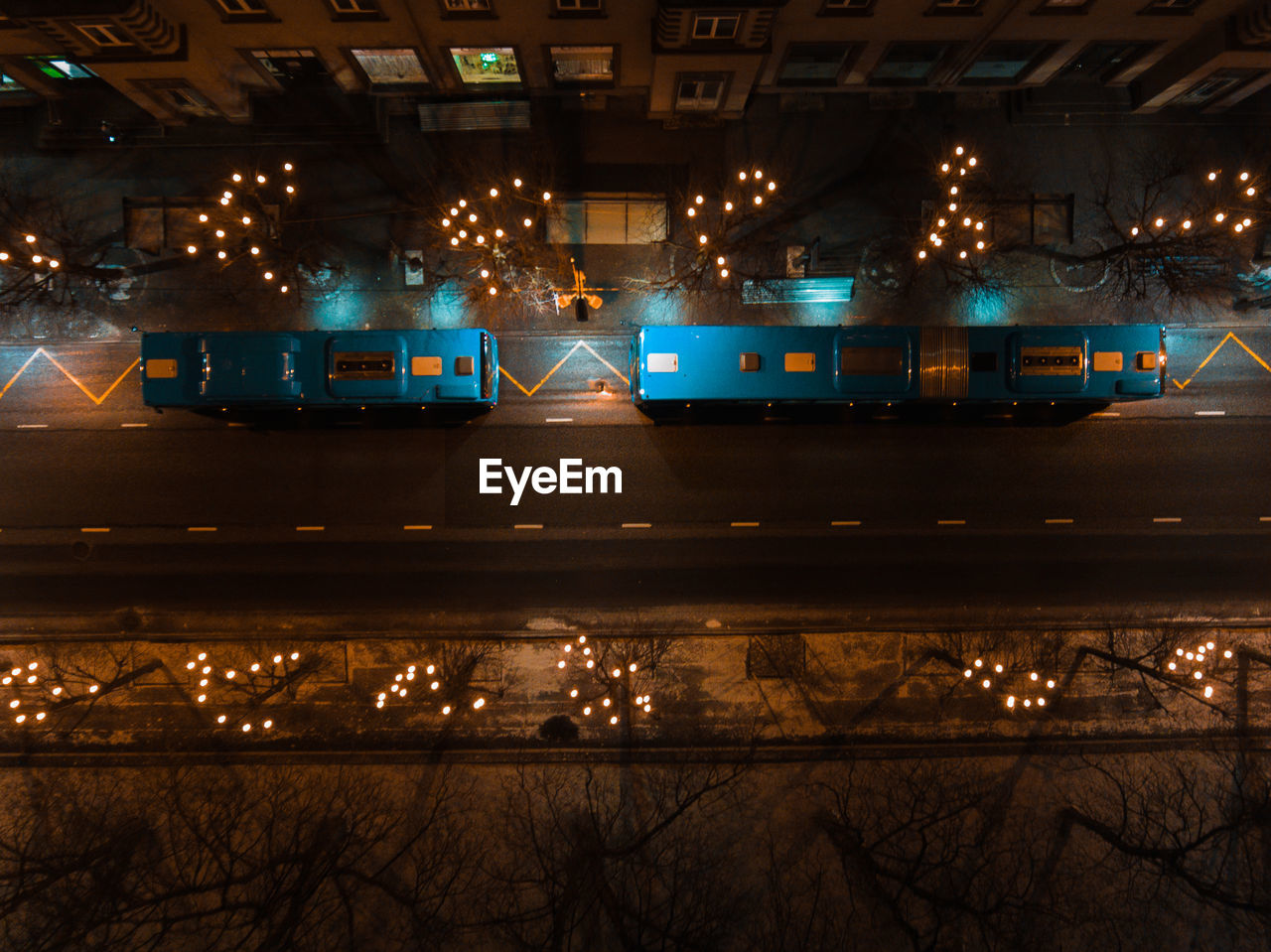 High angle view of vehicles on road at night