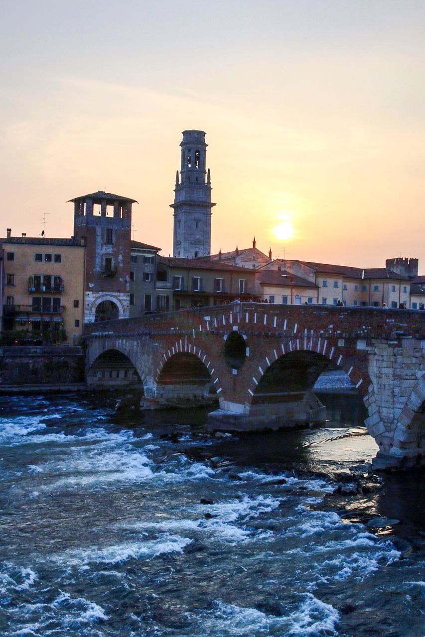 River in town at sunset