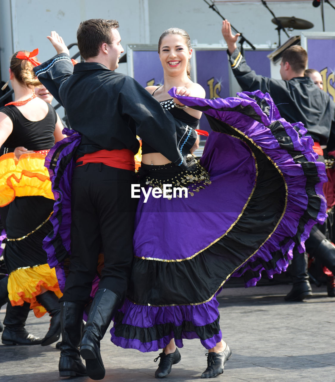 WOMEN DANCING IN TRADITIONAL CLOTHING