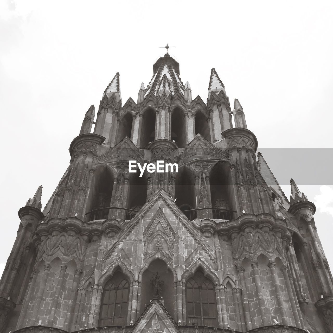 Low angle view of iglesia de san miguel arcangel against sky