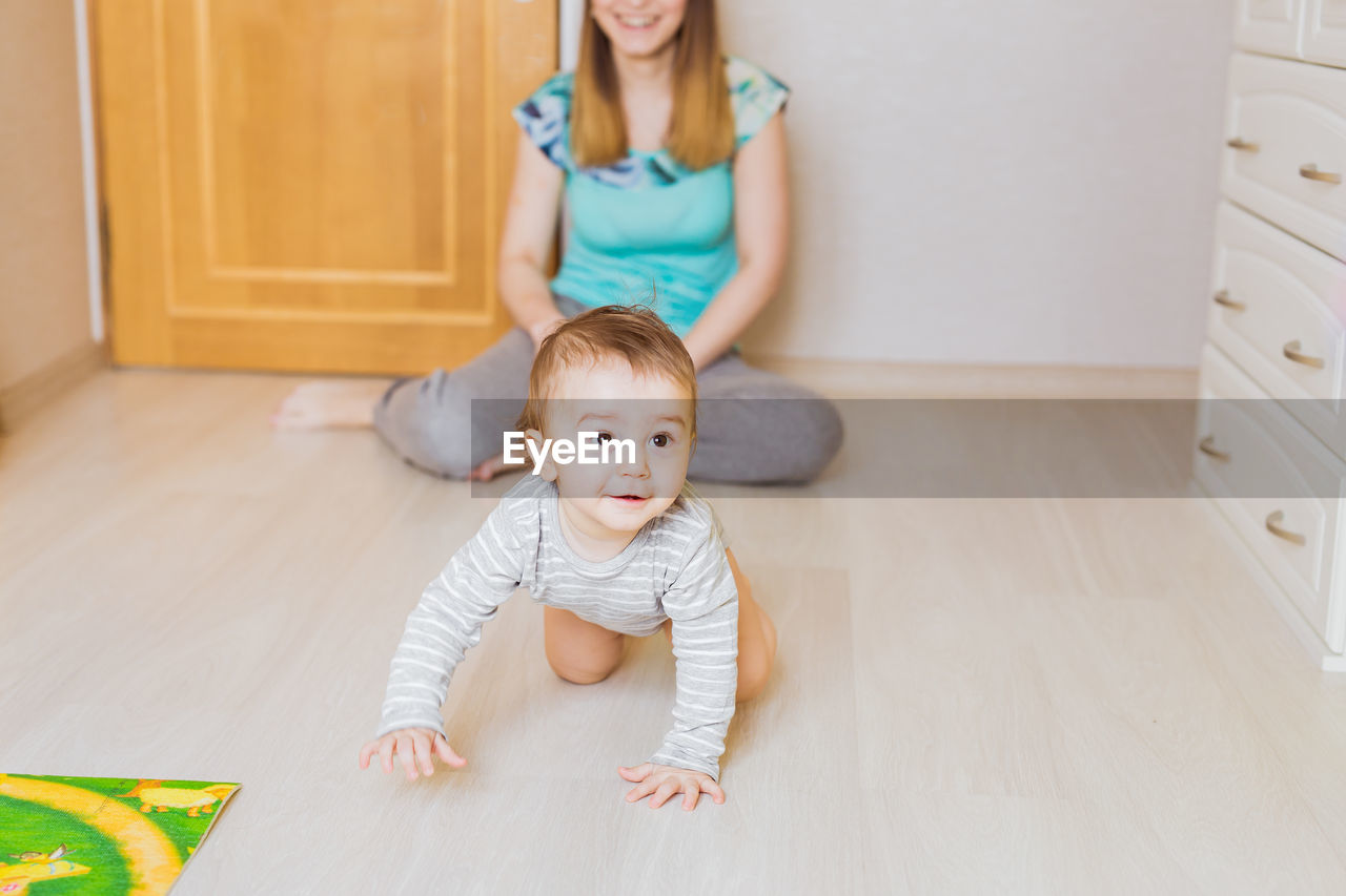 Portrait of cute baby girl at home