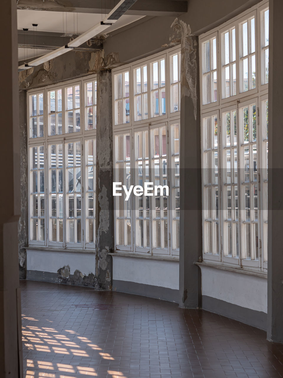 BUILDING SEEN THROUGH GLASS DOOR