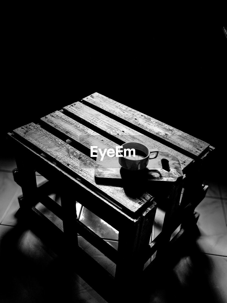 High angle view of man sitting on table