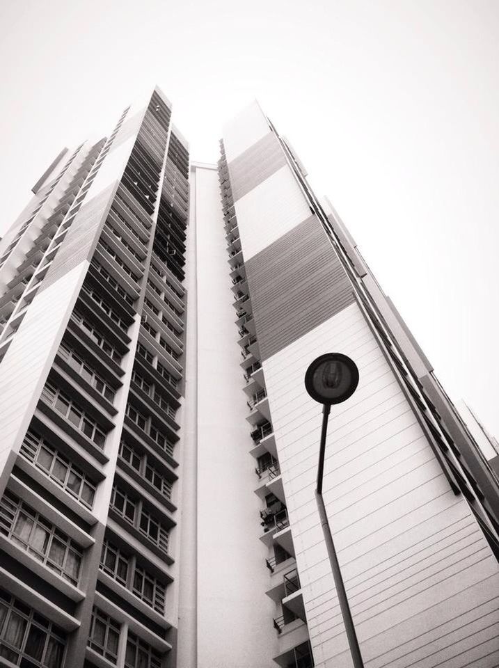 LOW ANGLE VIEW OF MODERN BUILDINGS