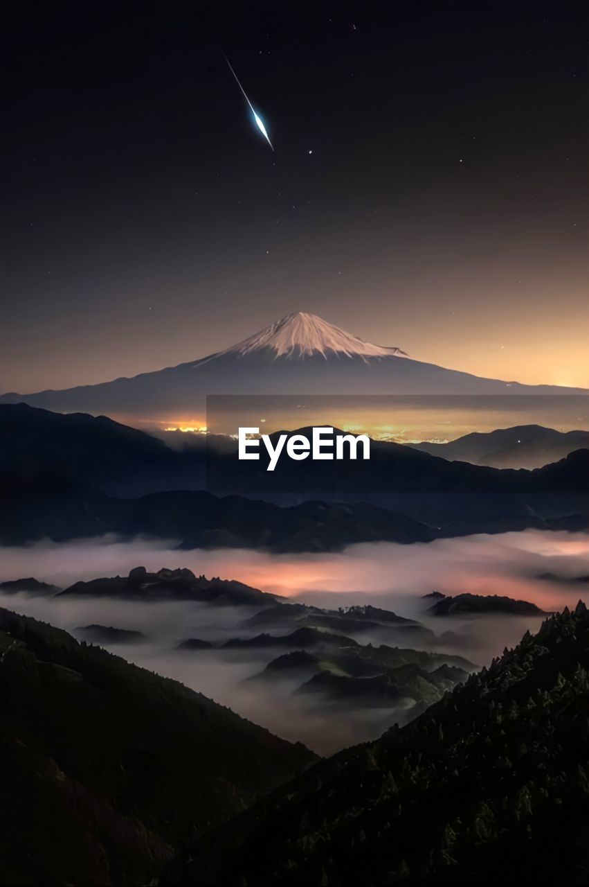 Scenic view of mountains against sky during sunset