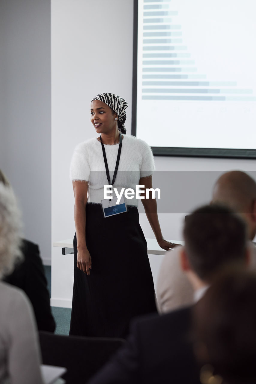 Woman having presentation during business meeting