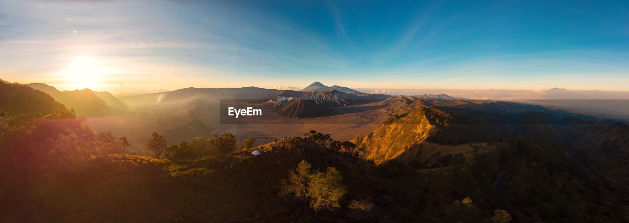 Panoramic view of volcanic landscape against sky during sunset