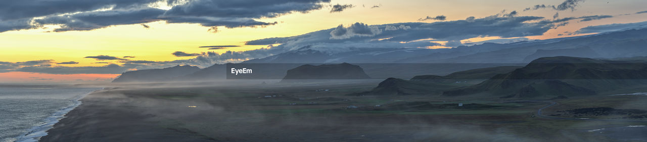 environment, landscape, sky, scenics - nature, cloud, mountain, water, beauty in nature, sunset, nature, sea, land, travel, travel destinations, cold temperature, ice, dawn, sun, fog, panoramic, dramatic sky, glacier, tranquility, outdoors, no people, wave, tourism, snow, mountain range, winter, twilight, ocean, social issues, beach, reflection, rock, coast, tranquil scene, non-urban scene