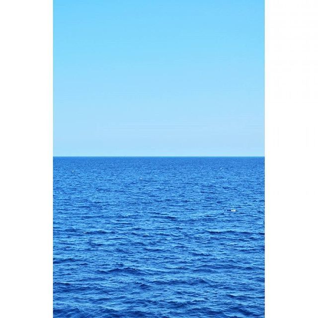 SCENIC VIEW OF SEASCAPE AGAINST SKY