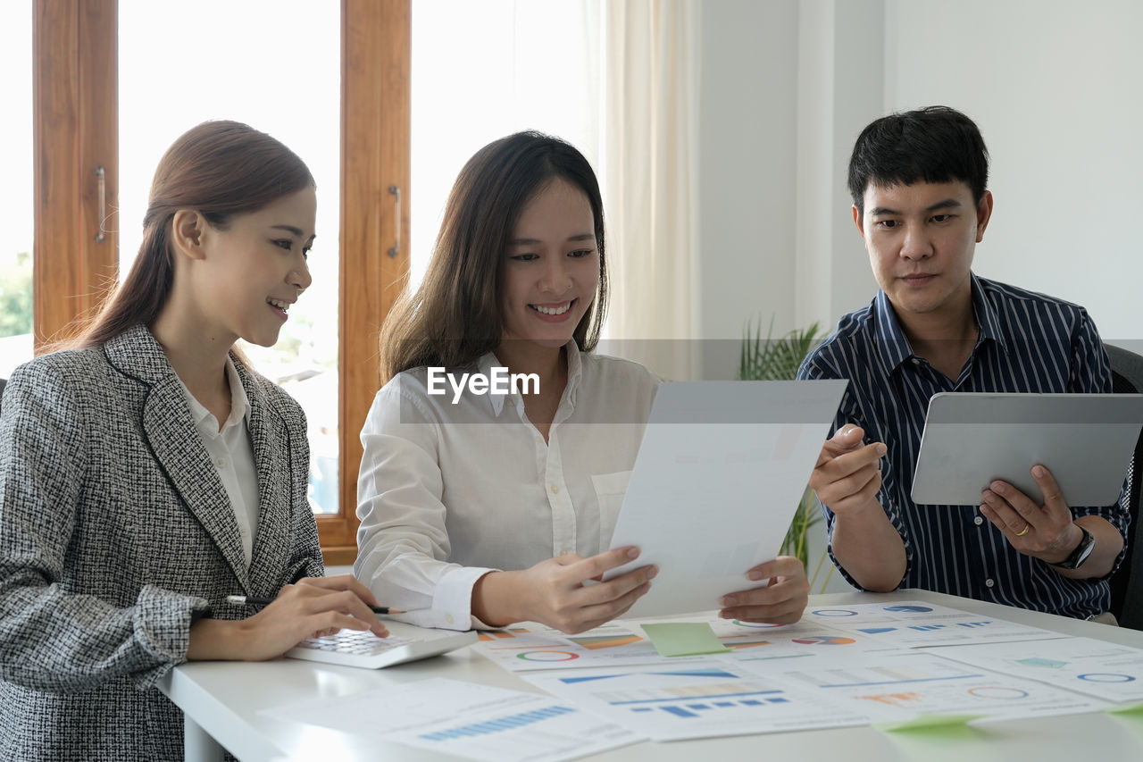 business colleagues working on table