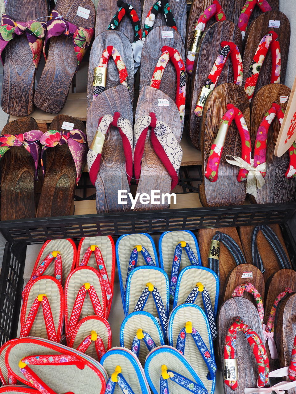 Full frame shot of multi colored footwear for sale at market stall