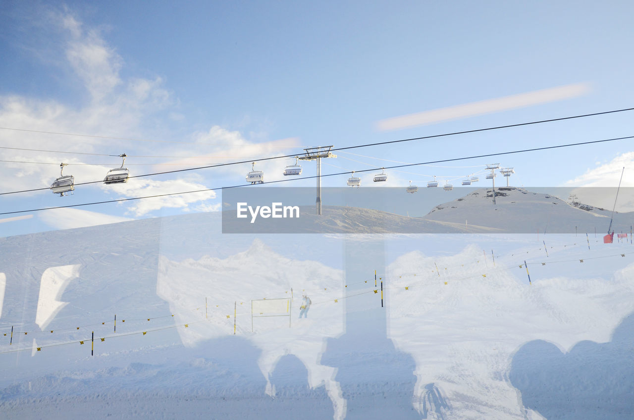 Cable cabins delivering tourists to the top of the matterhorn mountain in zermatt, switzerland.