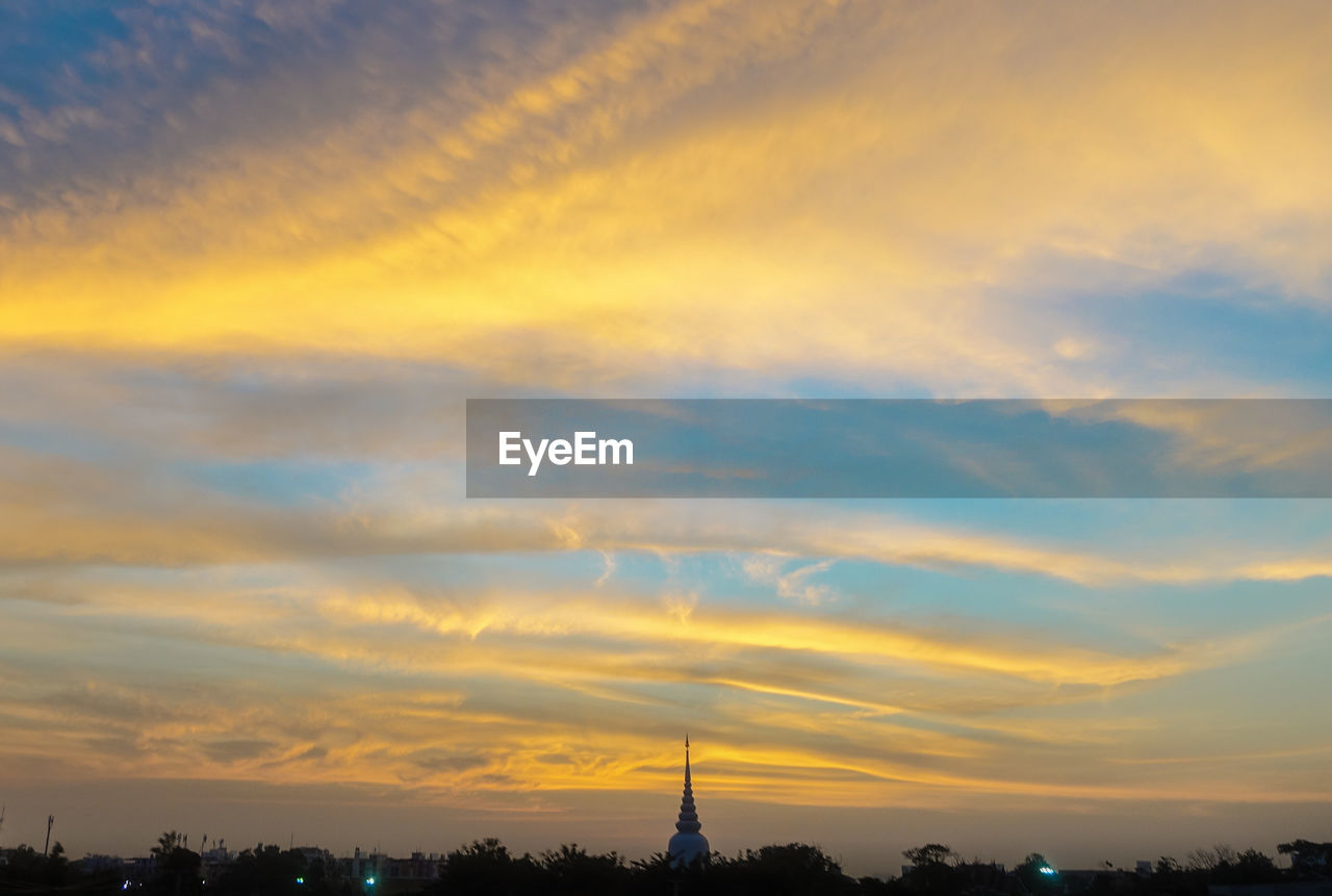 SILHOUETTE TOWER AGAINST SKY AT SUNSET