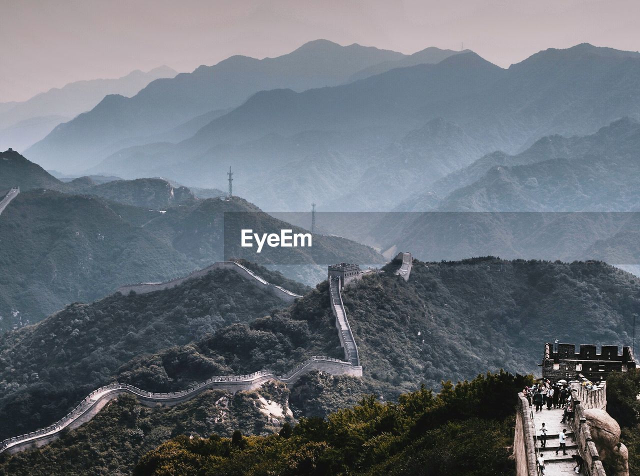 Aerial view of buildings against mountain range