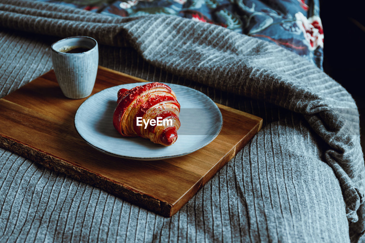 High angle view of breakfast on bed