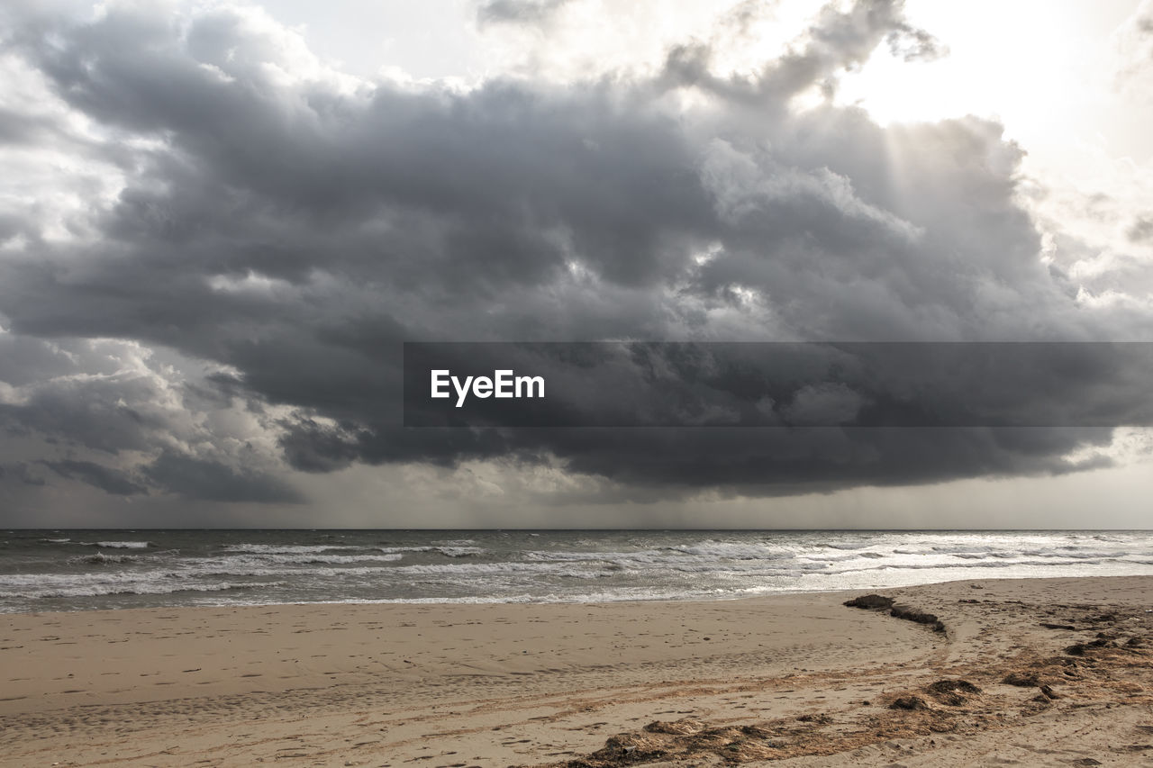 VIEW OF BEACH AGAINST SKY