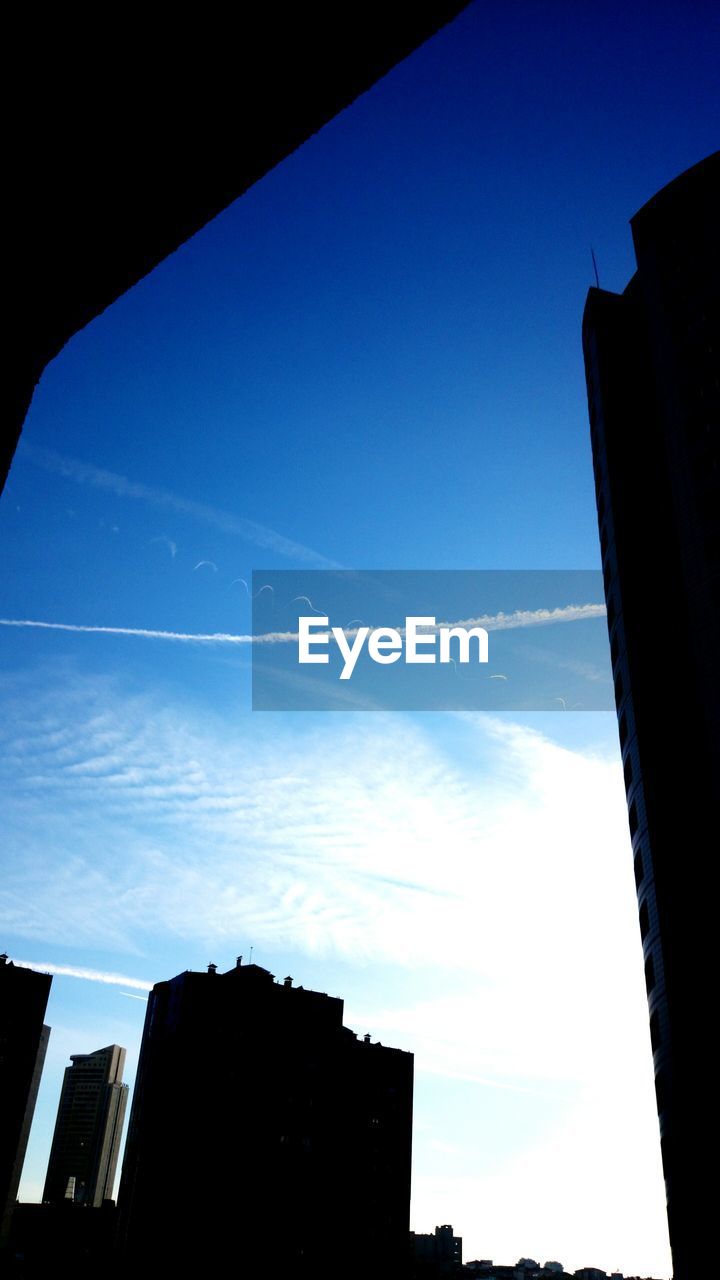 Silhouette of buildings against sky