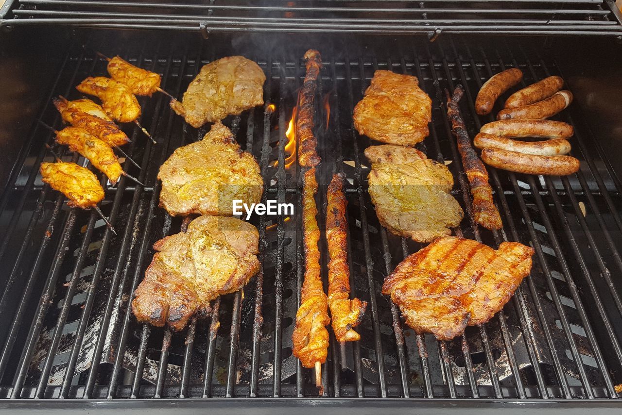 Close-up of meat on barbecue grill