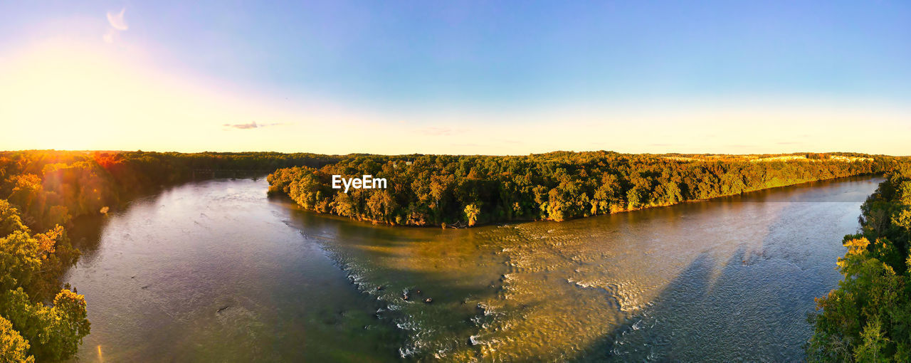 PANORAMIC VIEW OF LAND AGAINST SKY AT SUNSET