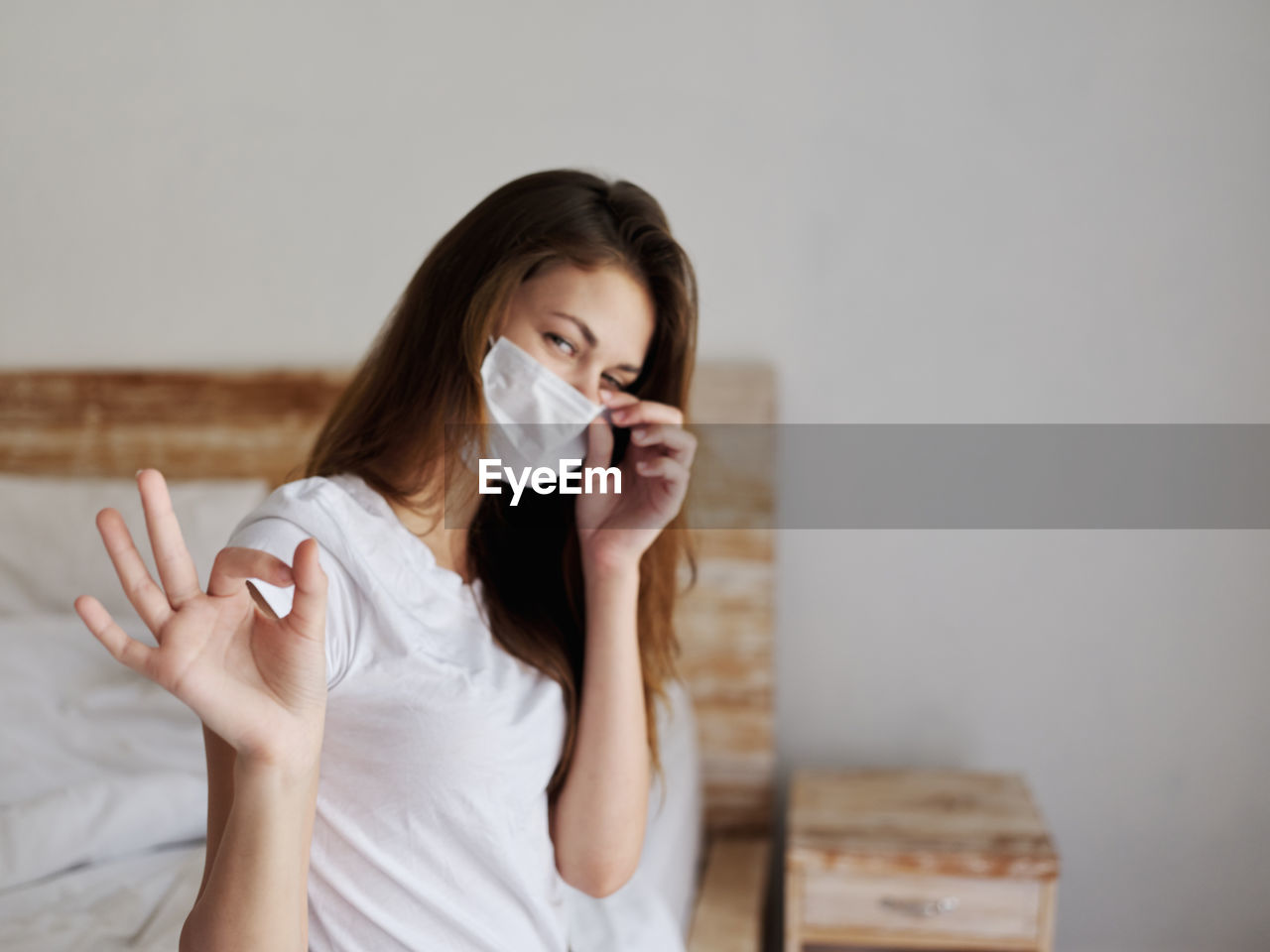 Portrait of a beautiful young woman drinking coffee