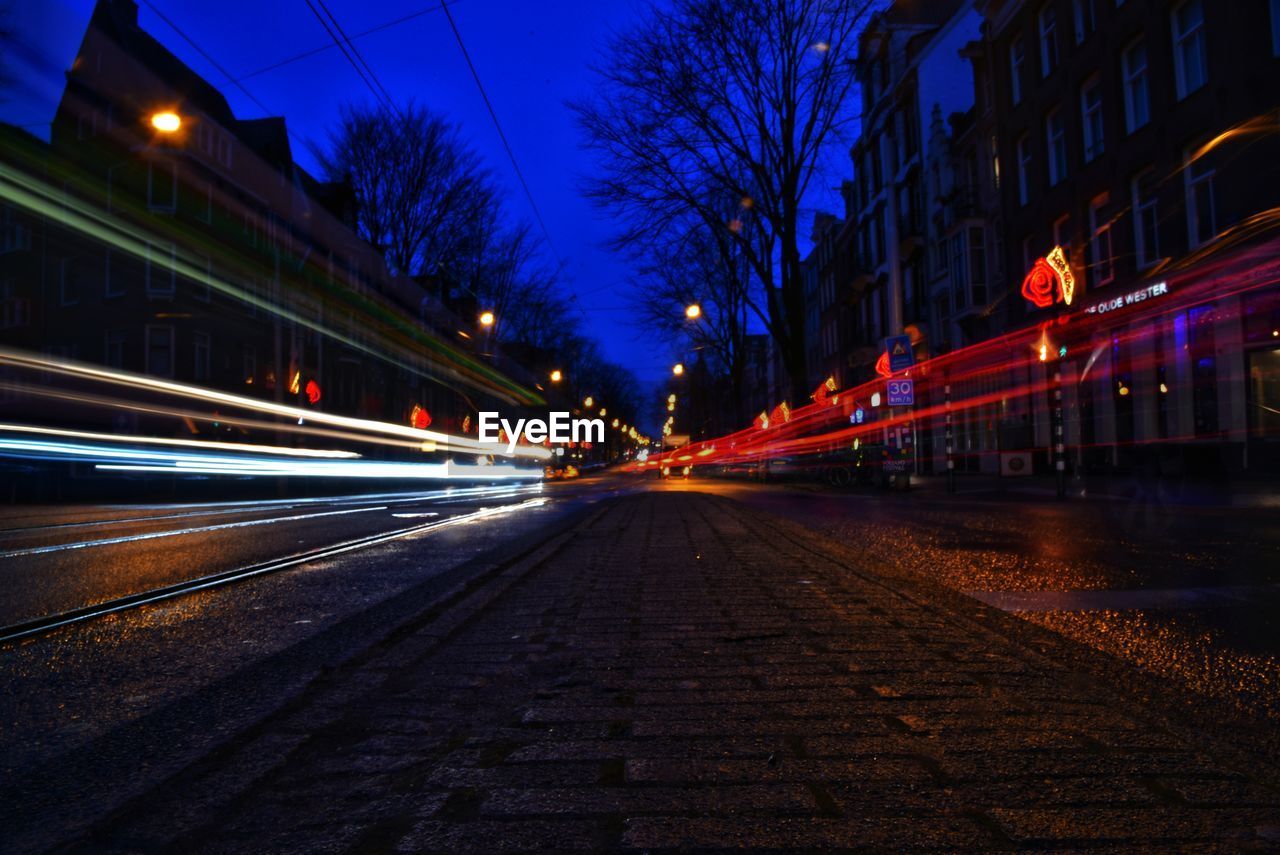 Light trails on city street at night