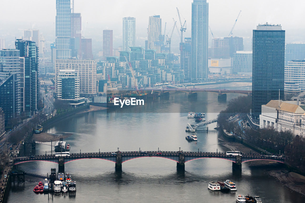 BRIDGE OVER RIVER IN CITY