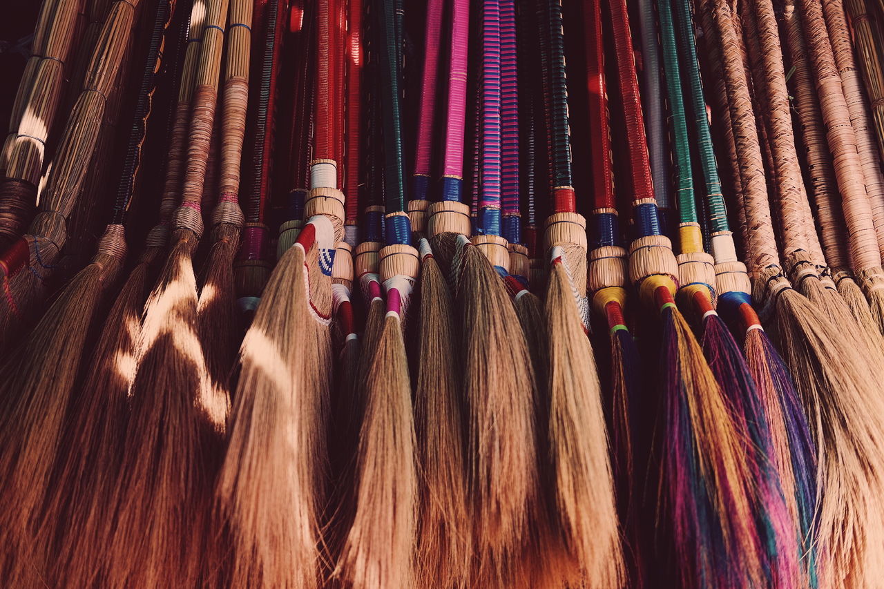 Full frame shot of brooms