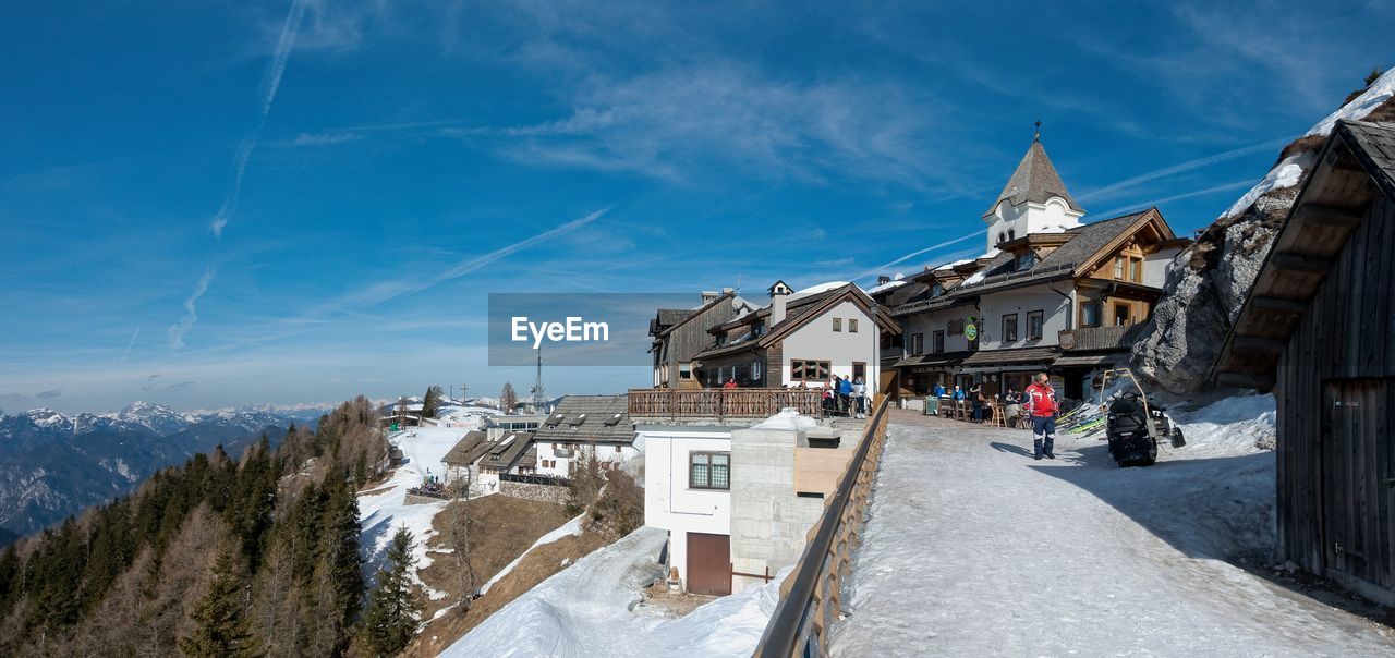 PANORAMIC VIEW OF BUILDINGS AGAINST SKY