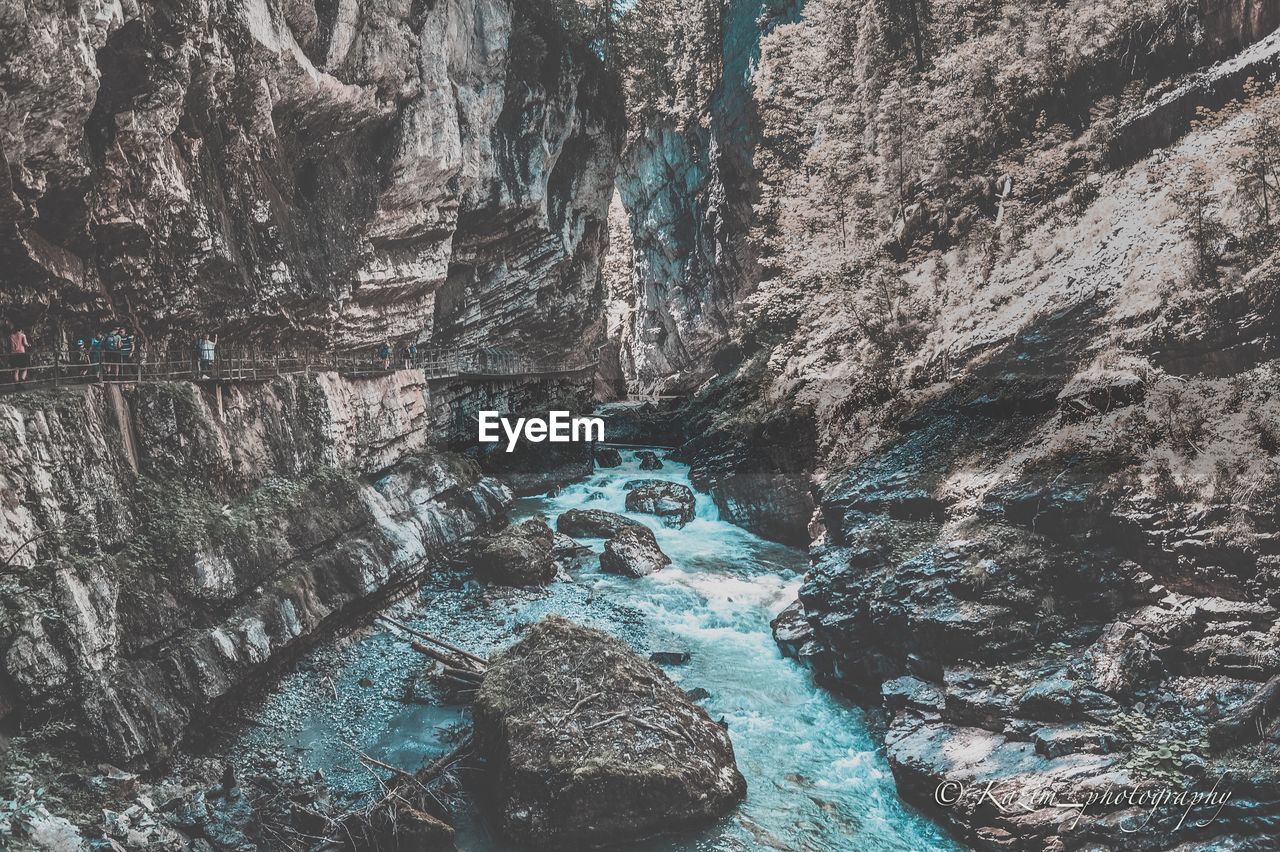 View of rock formations in water