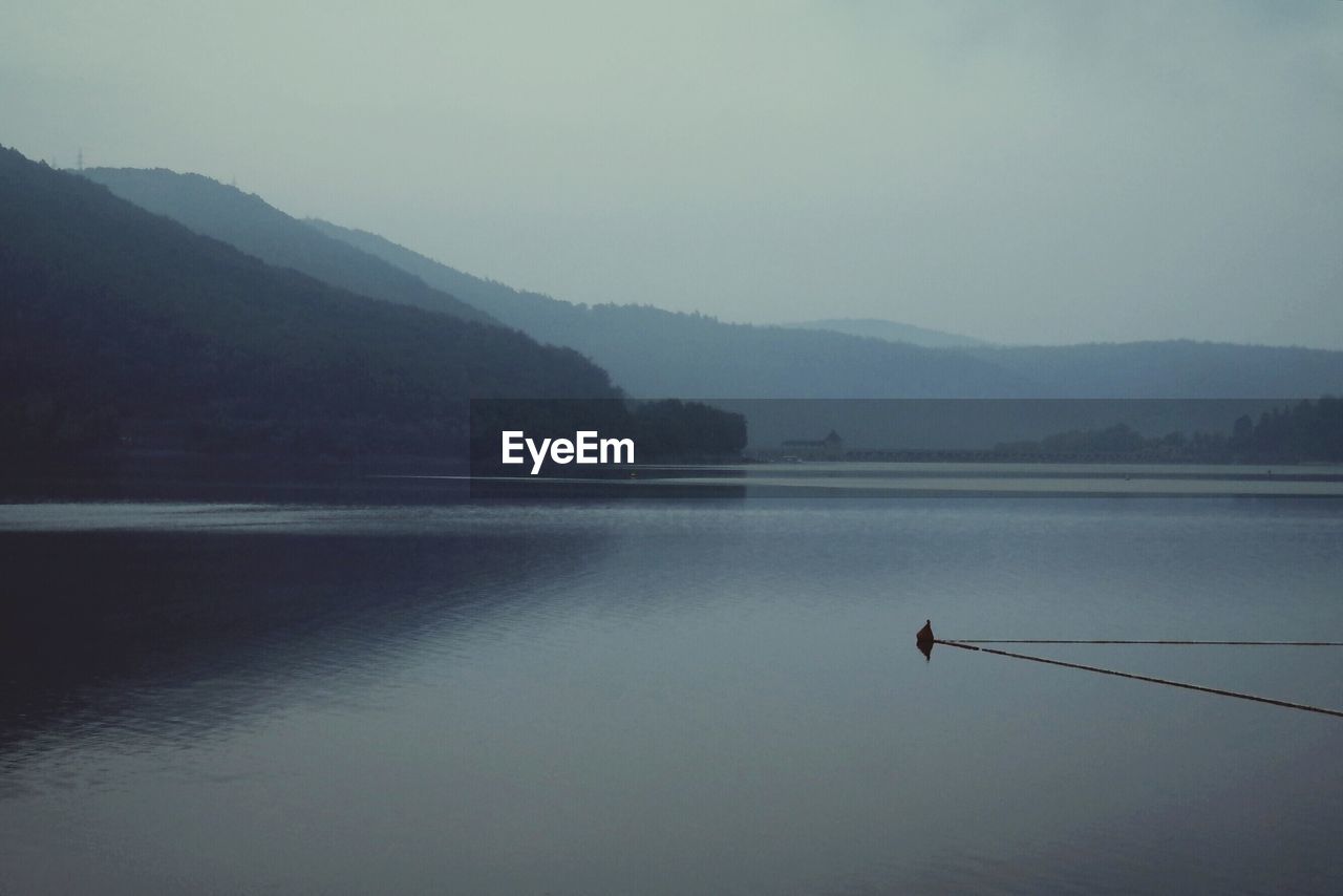 Idyllic view of lake against sky
