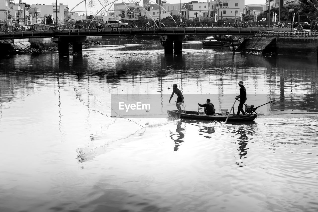 PEOPLE ON RIVER