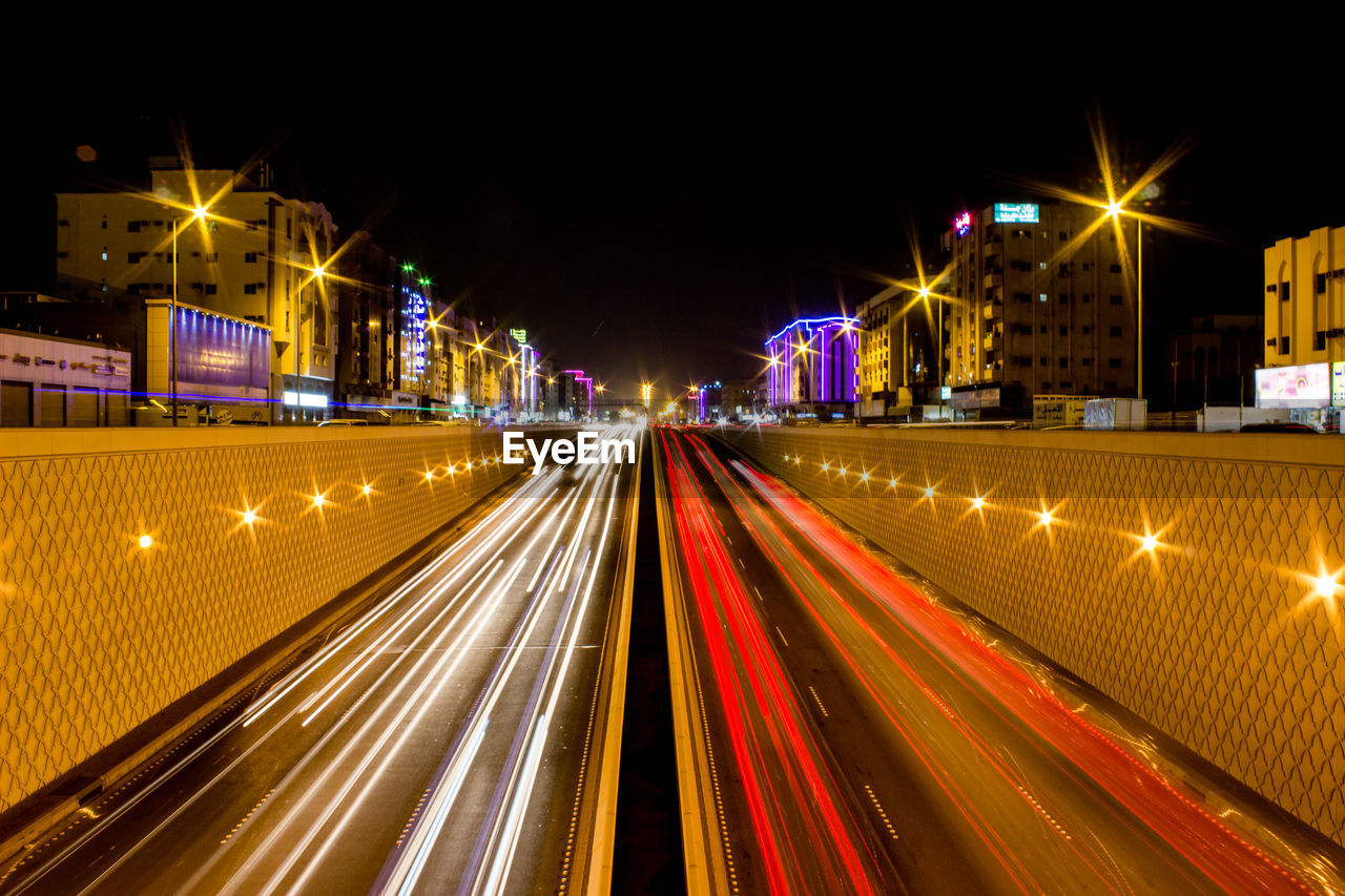 Light trails on city street at night