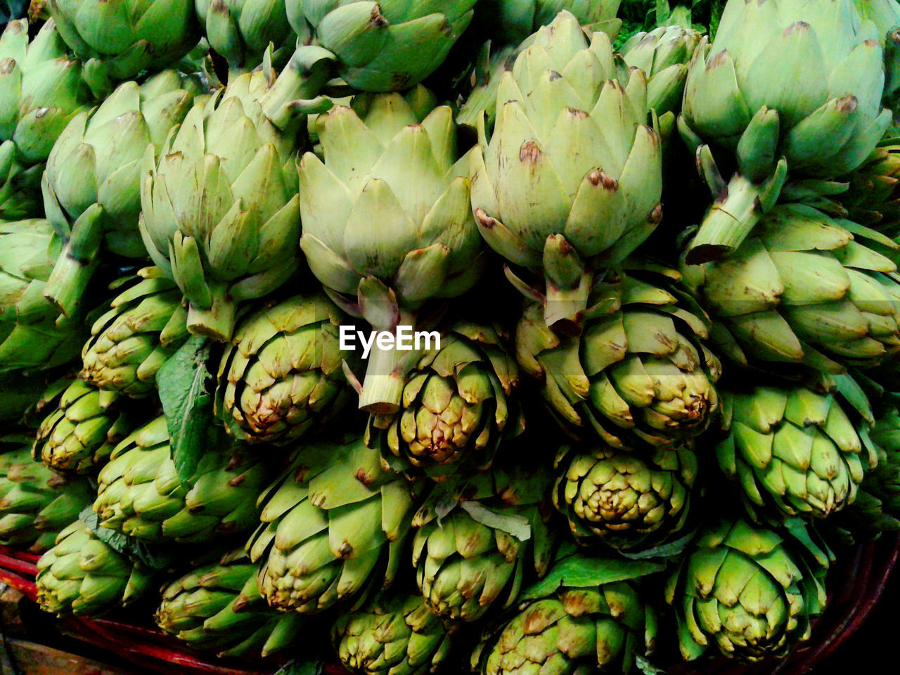 High angle view of artichokes for sale in market
