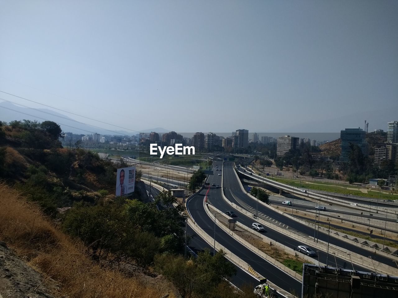 Aerial view of highway against clear sky