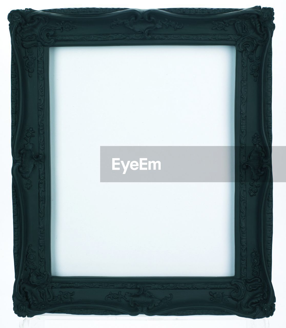 Close-up of blank picture frame against white background