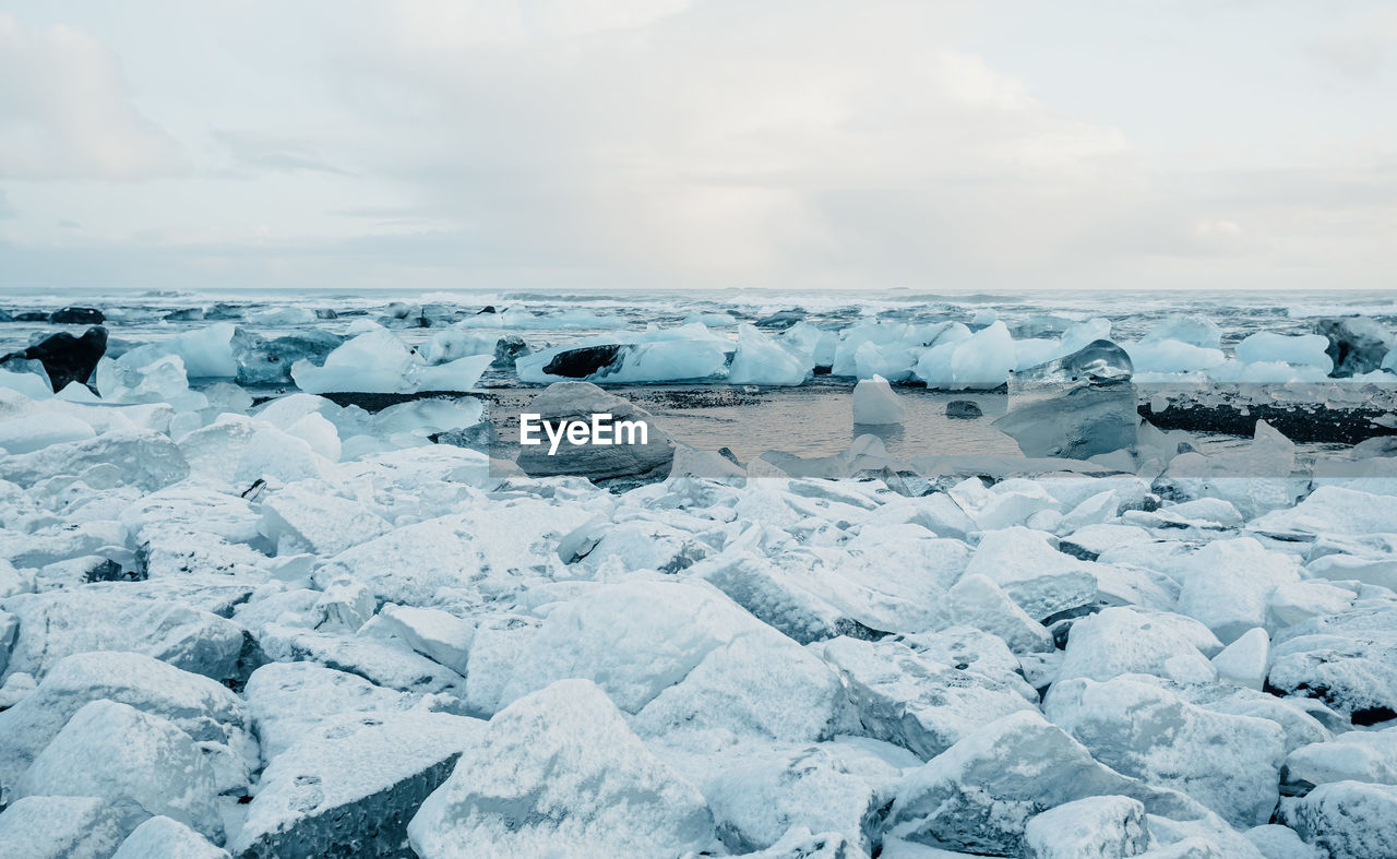 Breathtaking diamond beach on iceland in winter with large ice blocks, ice cubes