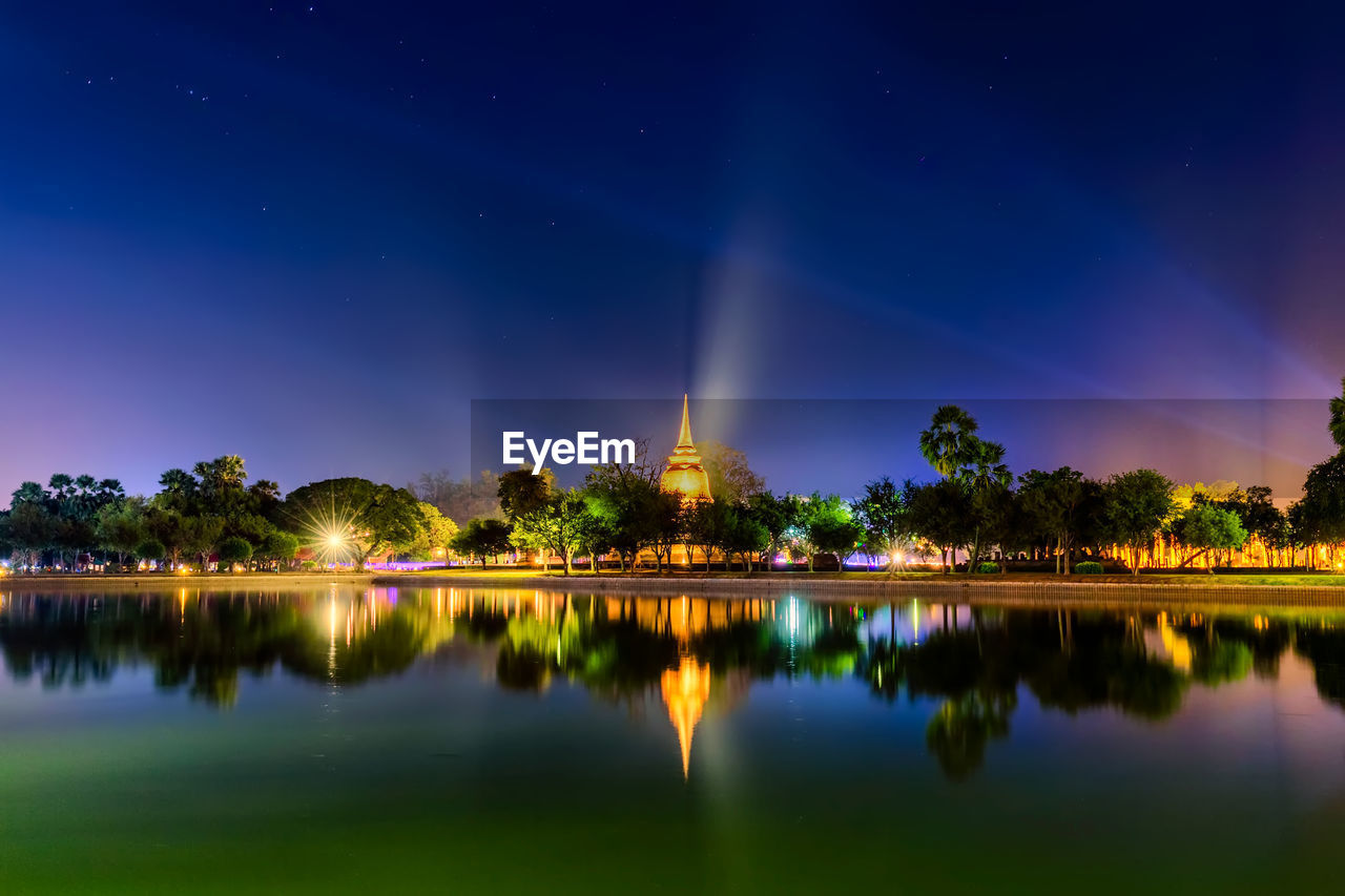 SCENIC VIEW OF LAKE AT NIGHT