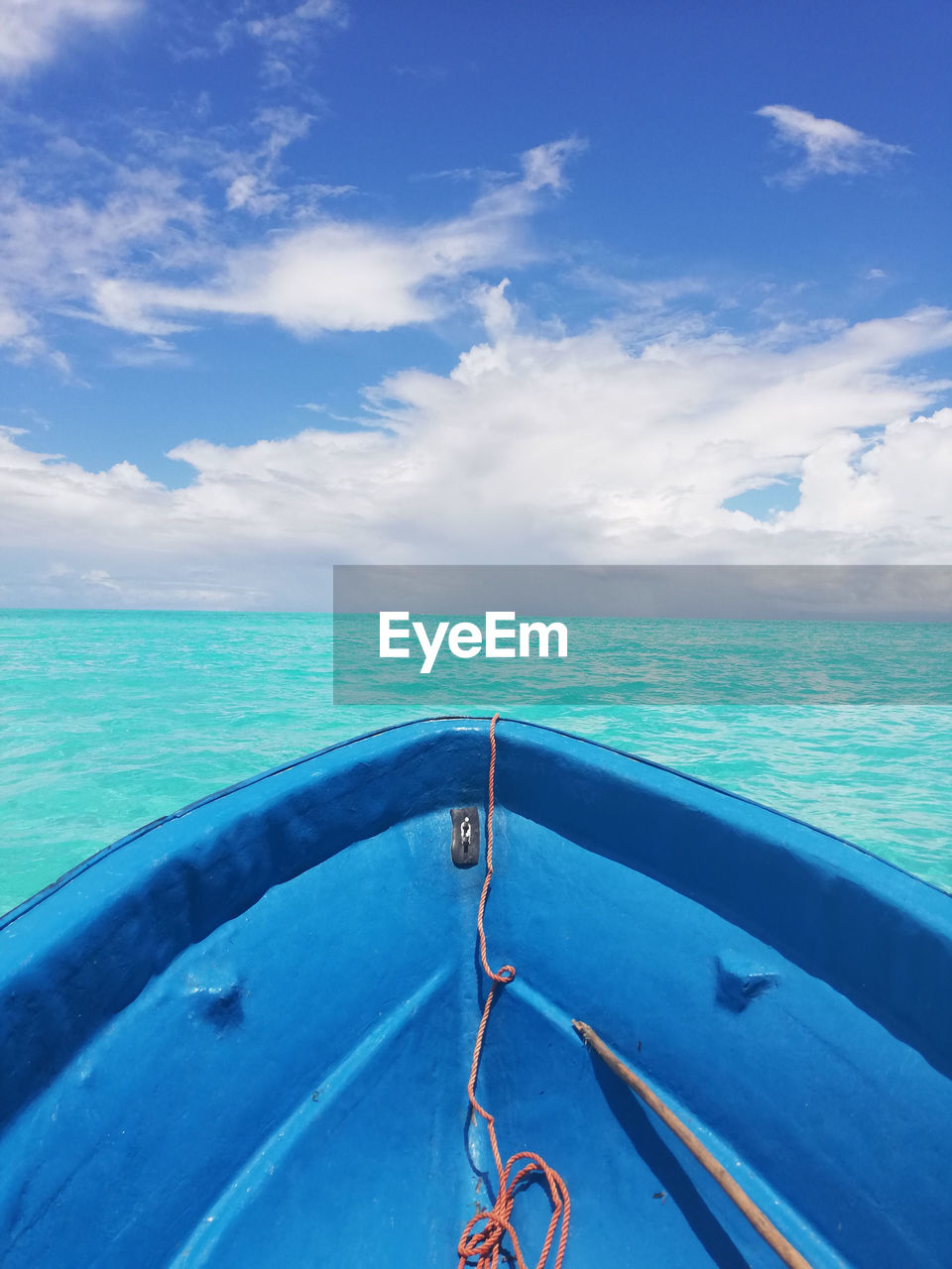 Scenic view of sea against blue sky