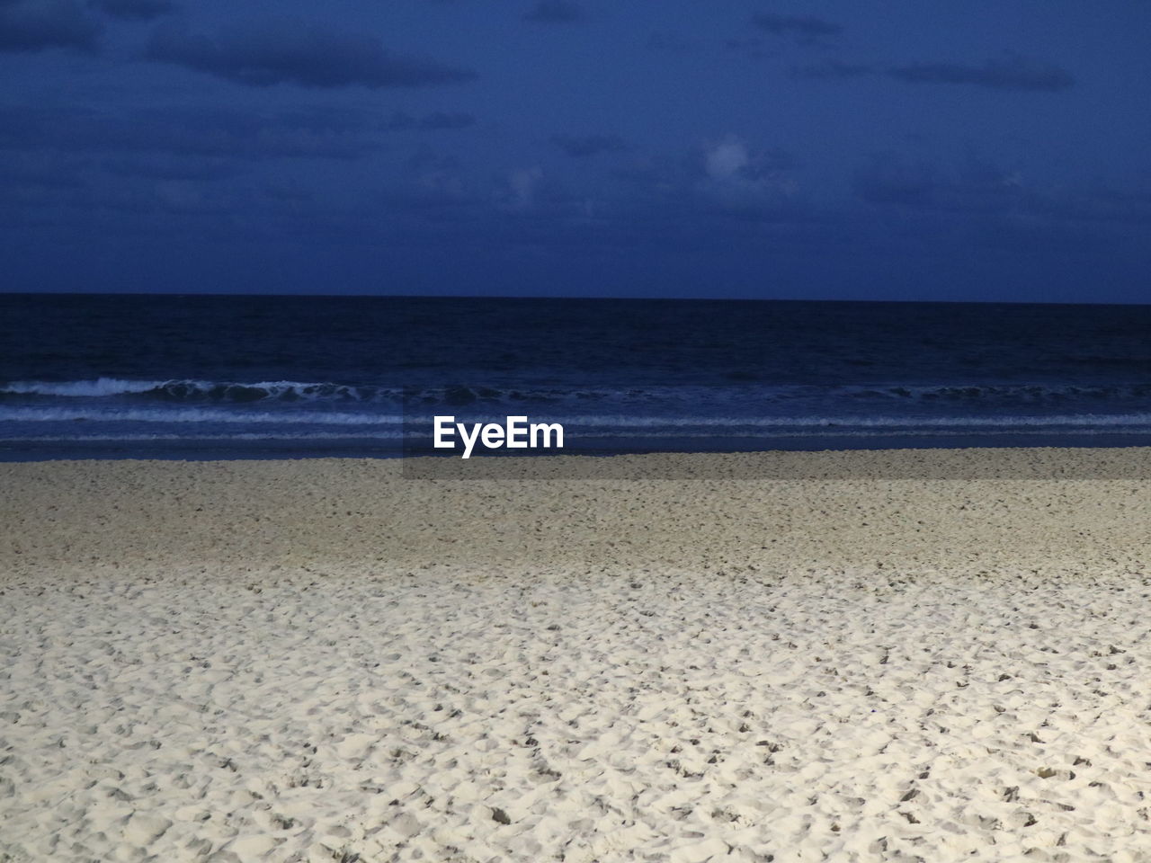 VIEW OF BEACH AGAINST SKY