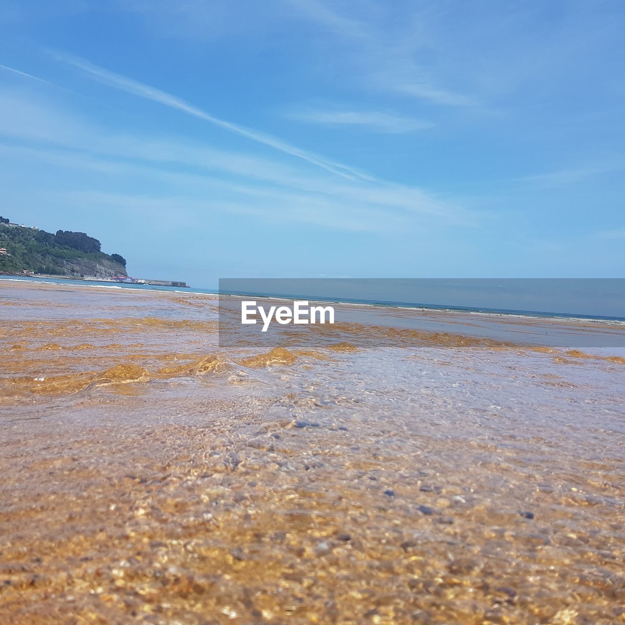 VIEW OF BEACH AGAINST SKY