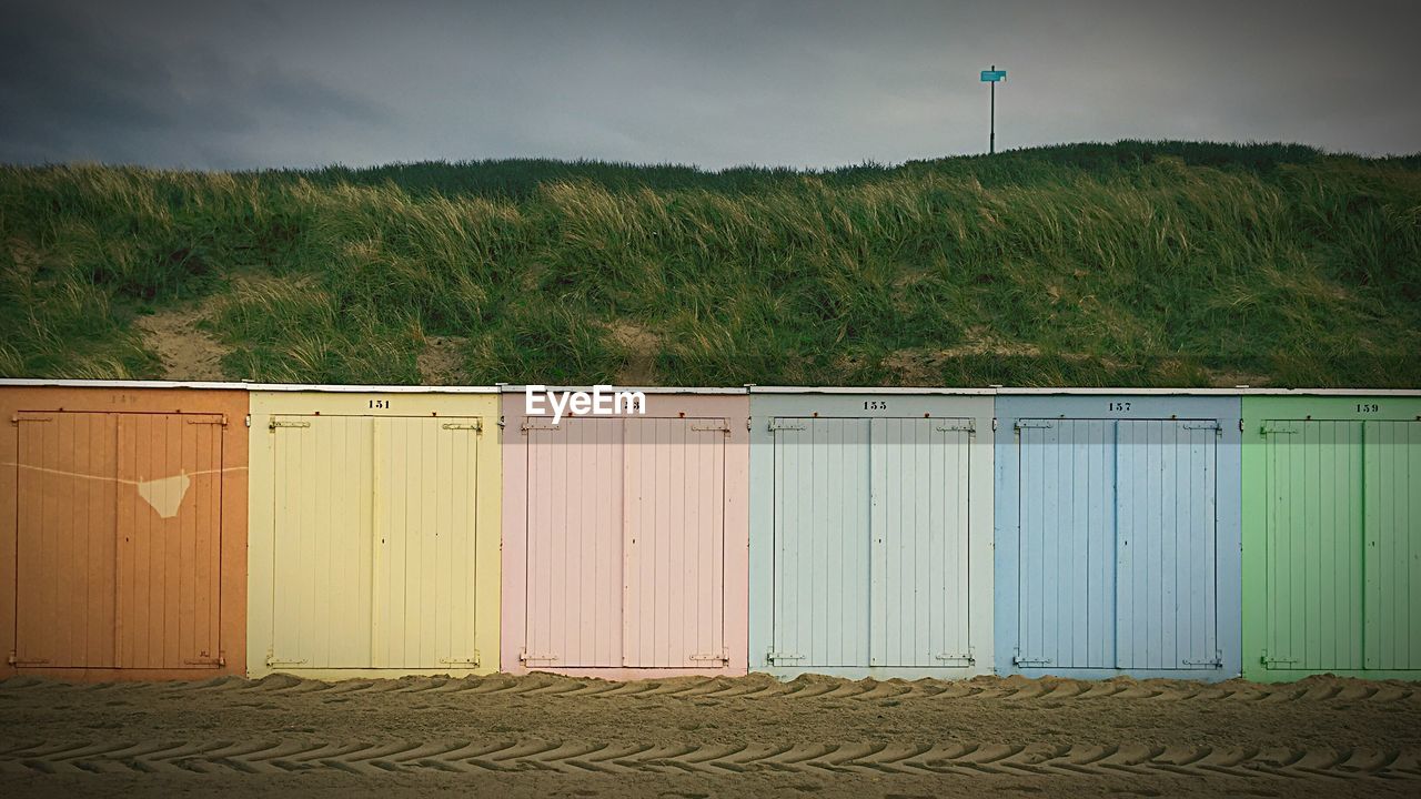 Multi colored huts on beach