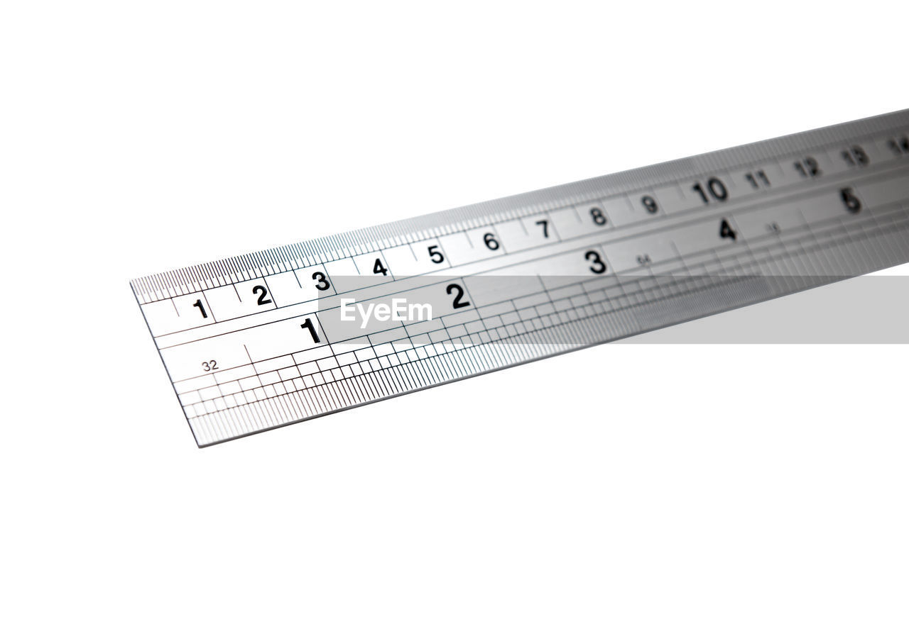 High angle view of ruler over white background