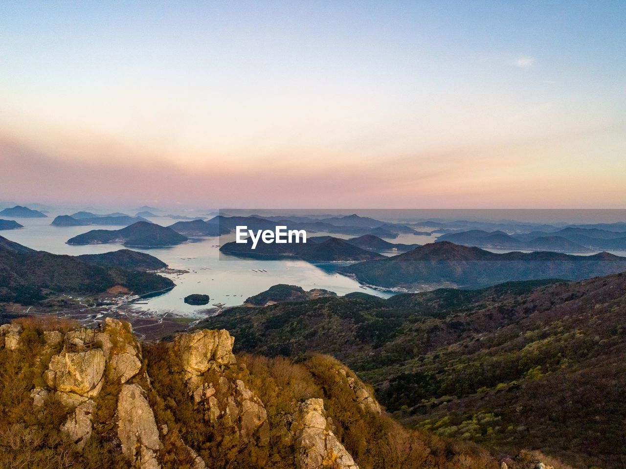 Scenic view of landscape against sky during sunset